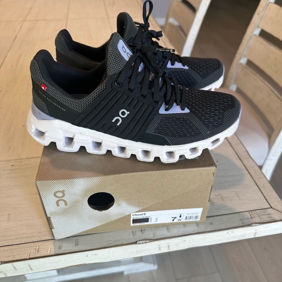 On Clouds Shoes - ON Women's Black and White Sneakers